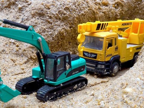 camiones y excavadora juguete
